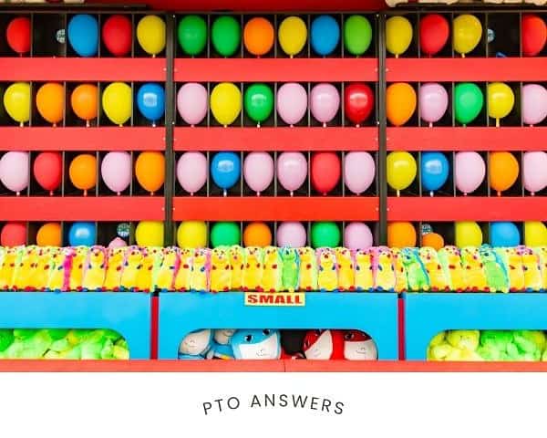 colorful balloon carnival game with prizes in bins below game